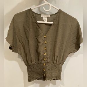 Planet Gold women’s green blouse. Snatches waist, wear it out or keep casual.